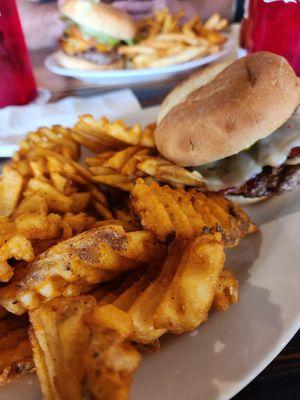 Burger w/bacon and waffle fries.