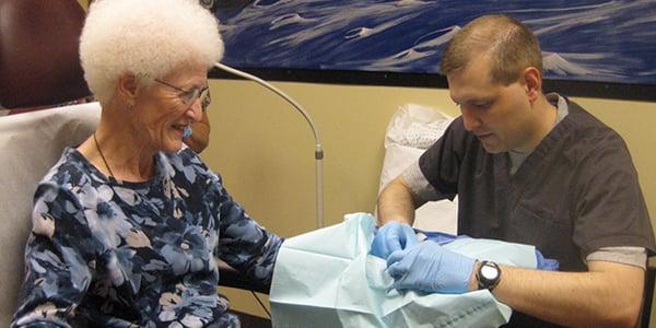 Dr. Hoover helping one of our amazing patients.