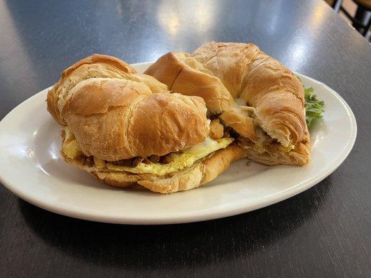 Breakfast sandwich with chorizo and pepper jack on their croissant