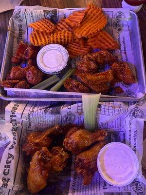 Yummy wings and sweet potato waffle fries