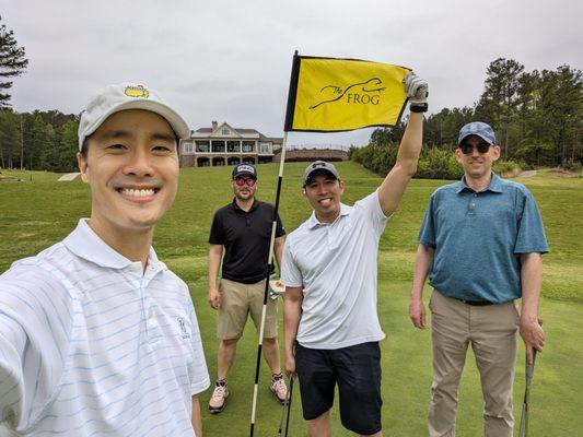 18th green with The Frog flag and clubhouse in background. Saturday, April 20, 2024.