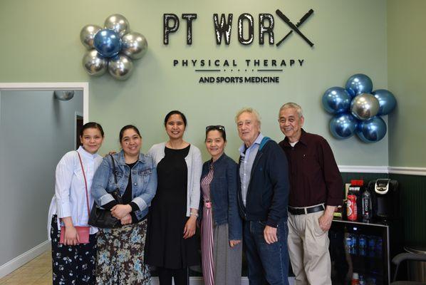 Dr. Shelby De Leon, Senior PT together with patients and guests during the Grand Opening