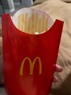 Medium fry in a large fry container