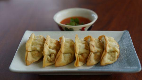 4. Pot Stickers
 Deep-fried dumplings stuffed with vegetables and served with Thai-style soy ginger sauce.