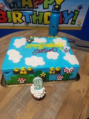 Custom Mario cake decorated with buttercream frosting.