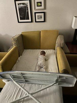 "Too busy" to bring us a crib so we had to improvise.