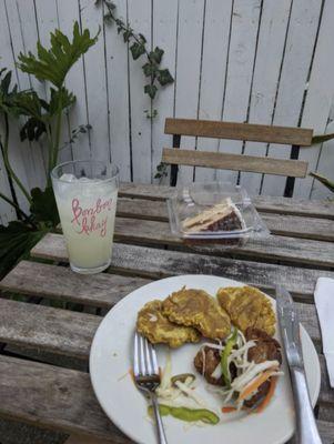 Griot and plantains, soursop limeade, and a slice of cake