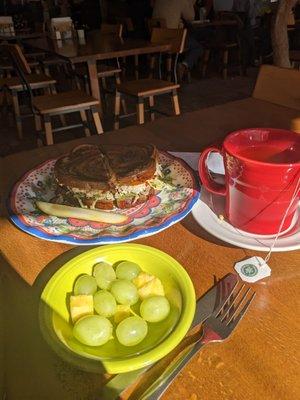 Delicious fresh tuna salad sandwich with fruit bowl complementary before noon