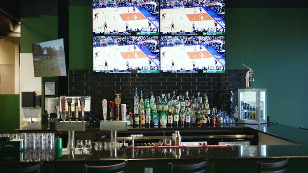 Full bar and videowall to catch all the action