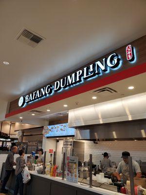 Order at the counter. In food court in the mall. Lots of seating.