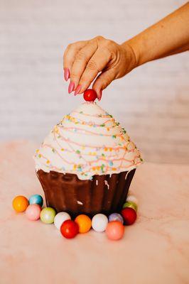 Giant chocolate piñata cupcake filled with candies for a group to share or you can eat it all yourself.