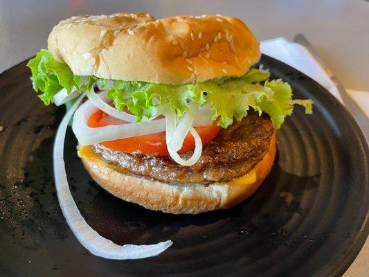 Cheeseburger Deluxe. Nice soft sesame bun.