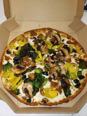 Garlic thin crust with sausage, mushrooms, banana peppers, spinach & black olives, white sause.