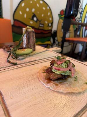 Pork belly taco and skelator taco