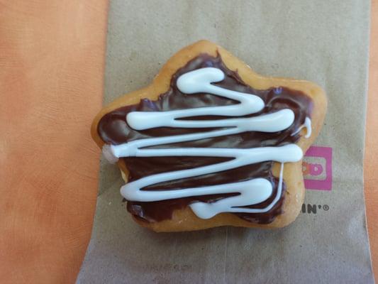 The #1 Dad Donut: a star shaped yeast donut with Barvarian creme filling,  chocolate icing and white icing drizzle.