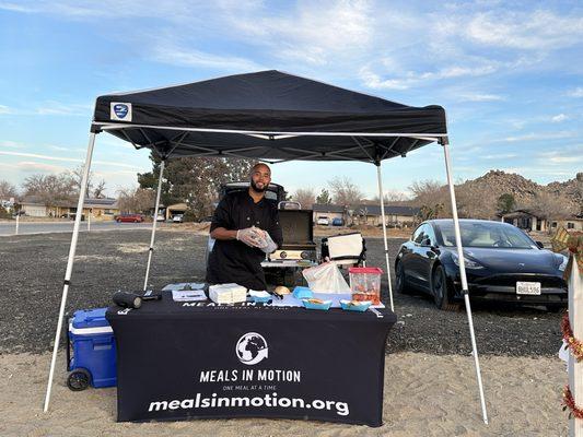 Meals in motion chef's booth fundraiser