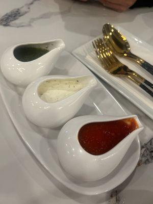 Their trio of sauces and their gold cutleries.