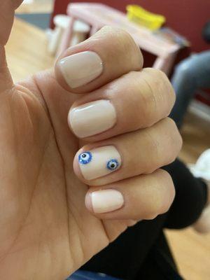 Gel Manicure with Evil Eye Design