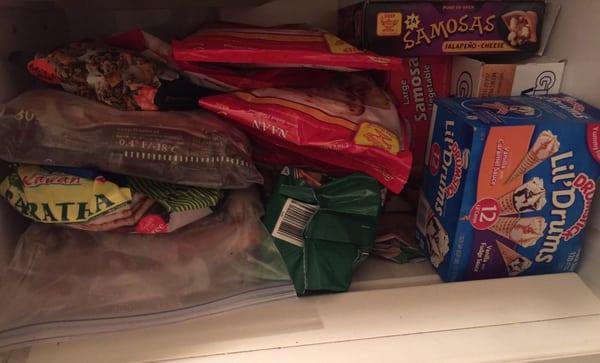 My freezer full of foods from Punjab except the lil' drums and waffles.