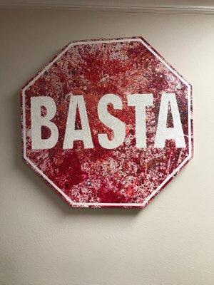 Basta means enough in Spanish