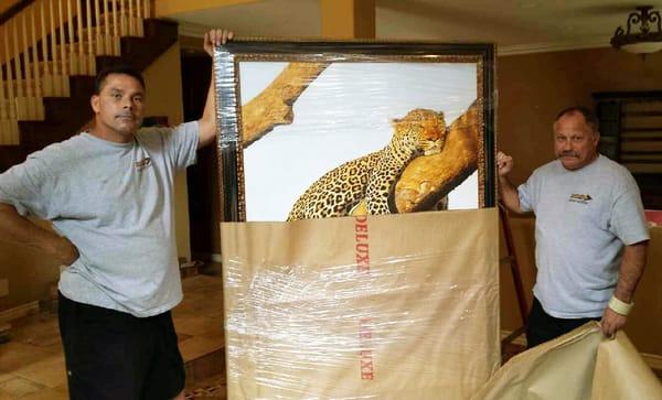 Packing a clients large artwork.