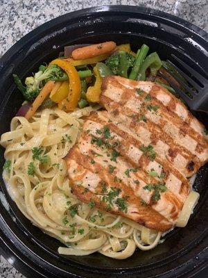 Grilled salmon with Alfredo fettuccine