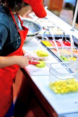 The Fresh Mango toppings were  chopped right in front of me and got refilled the bin.