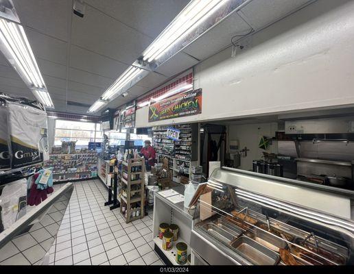 Small grill is to the right of the register.