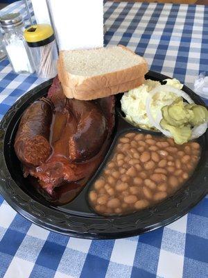 The two meat plate. With homemade sausage link and sliced brisket. The two sides are baked beans and potato salad.