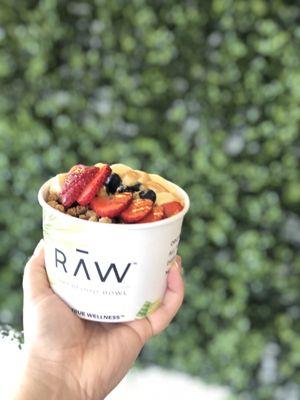 Raw base, fruit, granola, and peanut butter