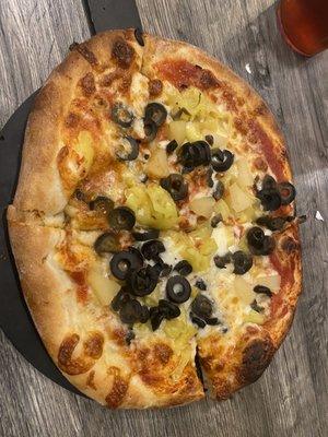 Personal pizza with black olives, banana peppers, & pineapple (yes, it goes on pizza!)