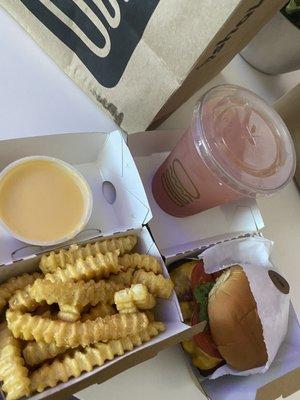 Burger and cheese fries... lemonade drink