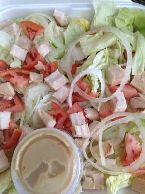 This is the grilled chicken salad $6.20 for iceberg lettuce, tomato, onion, and hardly and chicken