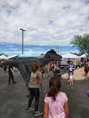 A raptor walking around from Dino Crew Entertainment.