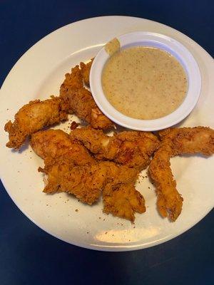 Chicken tender appetizer with honey mustard