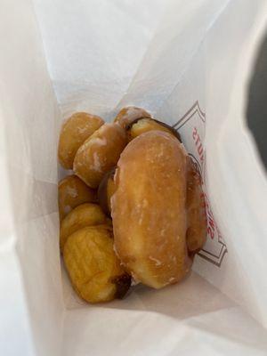 Donut holes and a baby cinnamon roll