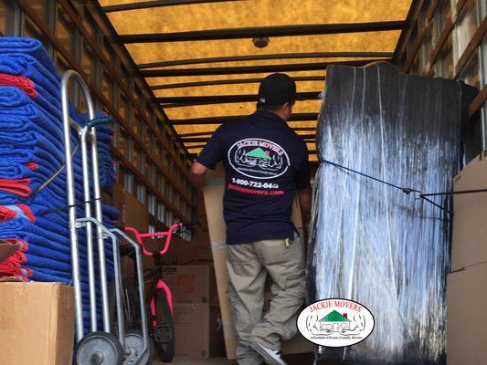 One Of Our Movers Loading Up The Truck For A Happy Client