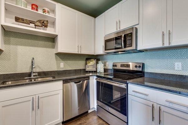 Kitchen with stainless steel appliances | The Cleo East Nashville