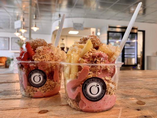 Strawberry smoothie bowl with pineapple on top; strawberry smoothie bowl with strawberries on top