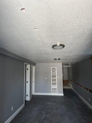 Cellulose Blown-In Insulation at between floor for soundproofing.