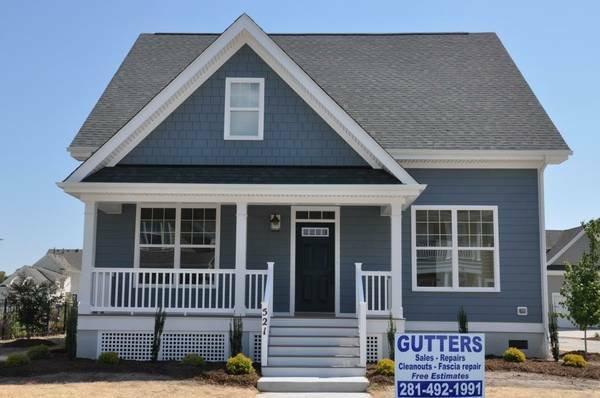 White 5 inch Gutters in Porter, Texas.