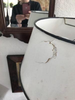 Lamp shades ripped by, putting heavy items on top