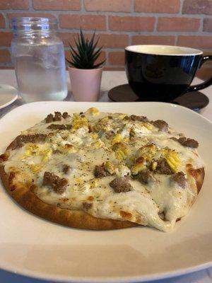 Breakfast pizza with sausage