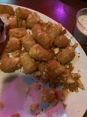 Cajun tots, but mostly just leftover deep-fried remnants of tots from the fryer