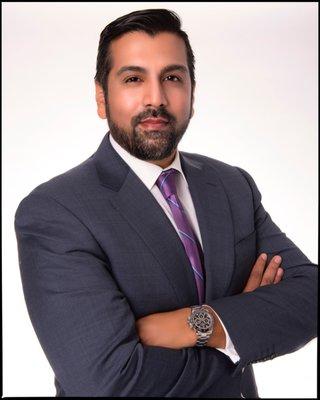 Nishad Khan, Esq.