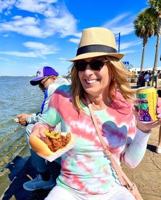 Having a cold beer and amazing chicken sandwich at the fair on the bank of Lake Pontchartrain