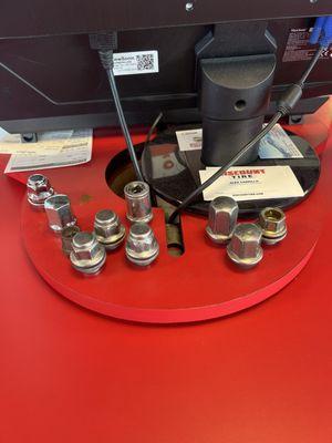 Lug nuts at the service desk at Discount Tire