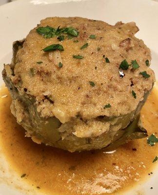 Delicious stuffed artichoke .