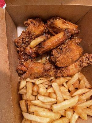 Honey old bay wings with fries