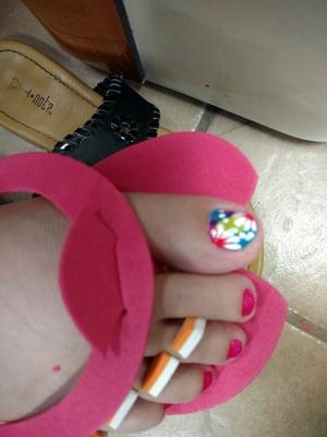 This is the design she did on my daughter's toes.